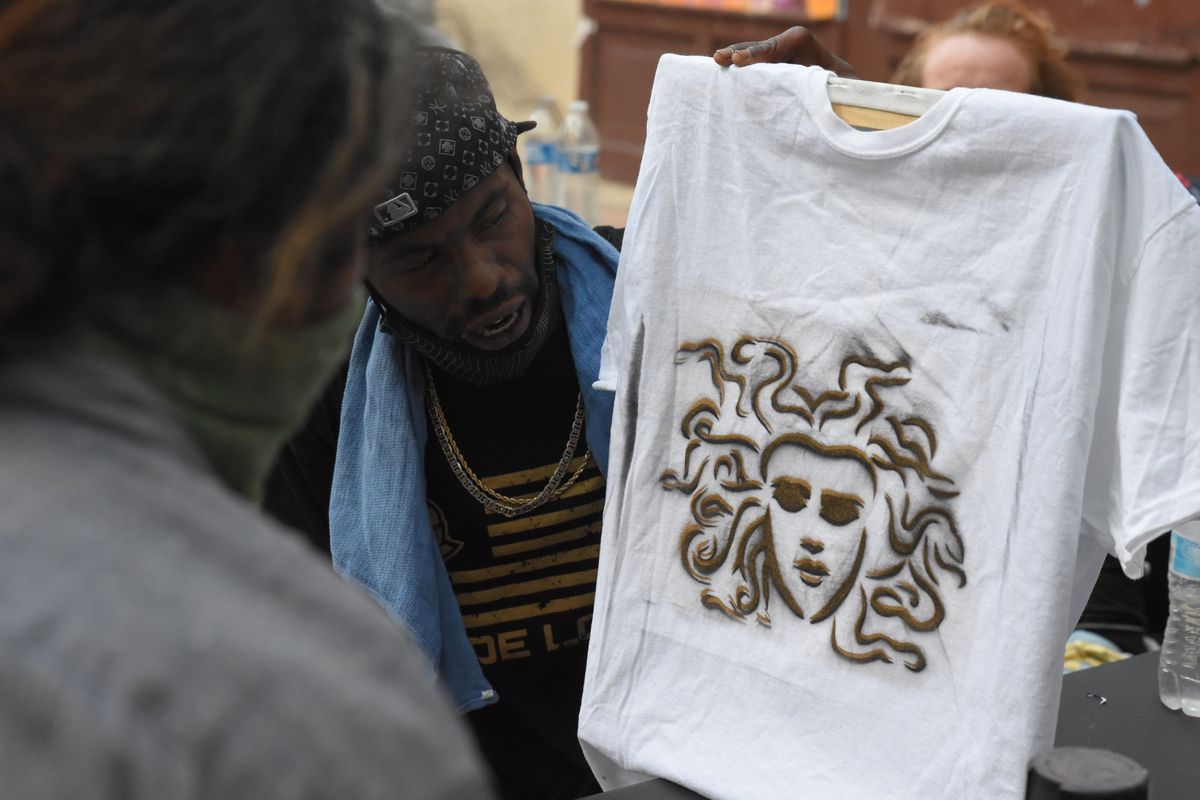 Homeless artists group brightens up 'Dark Side' of Austin's Sixth Street