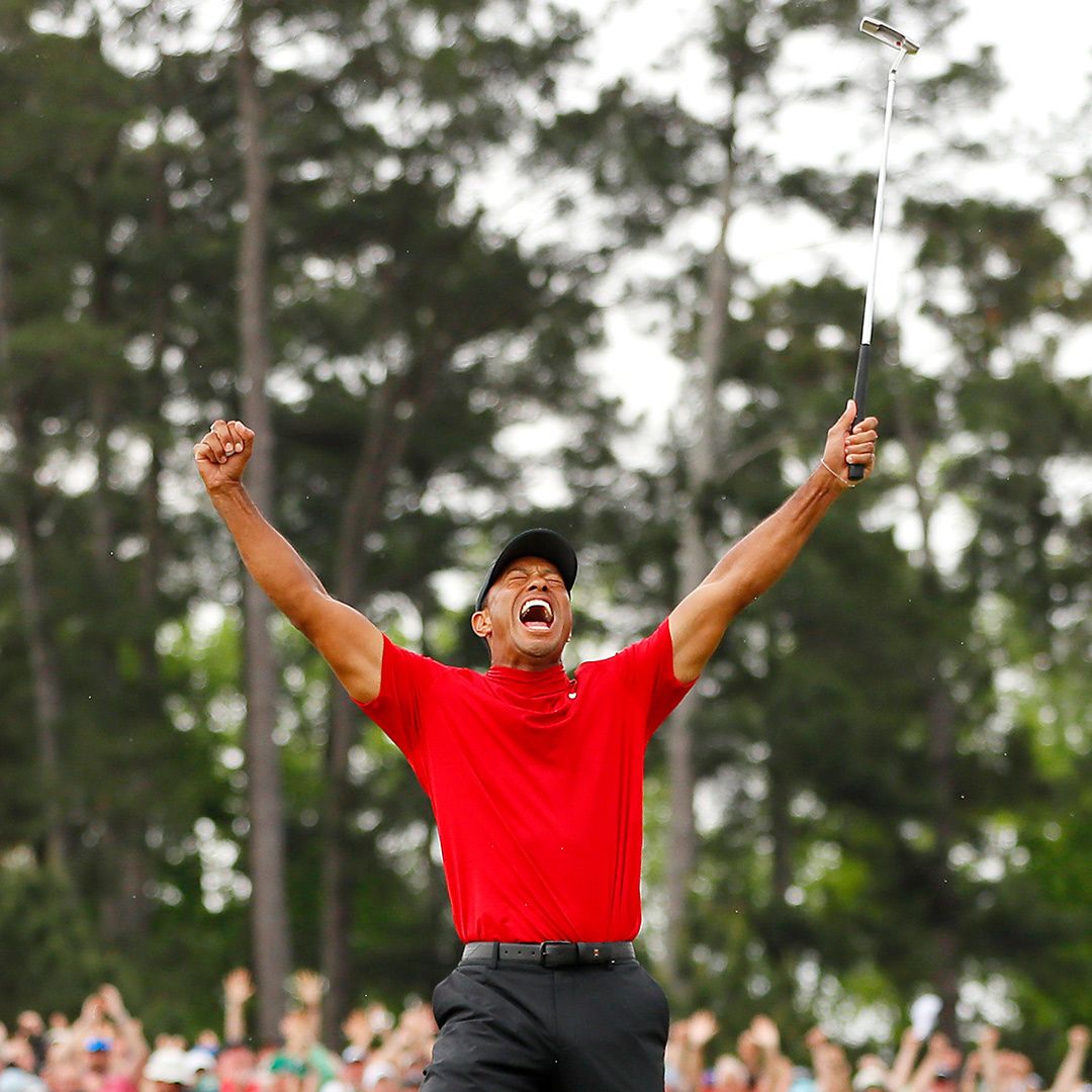 Tiger Woods celebrates on the green at the 2019 Masters.