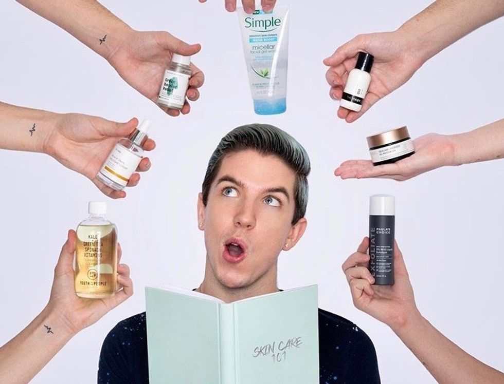 Skin care influencer Hyram surrounded by his favorite products. 