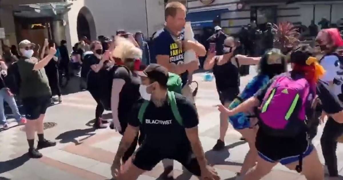 Seattle protesters show the best way to non-violently shut up a notorious street preacher