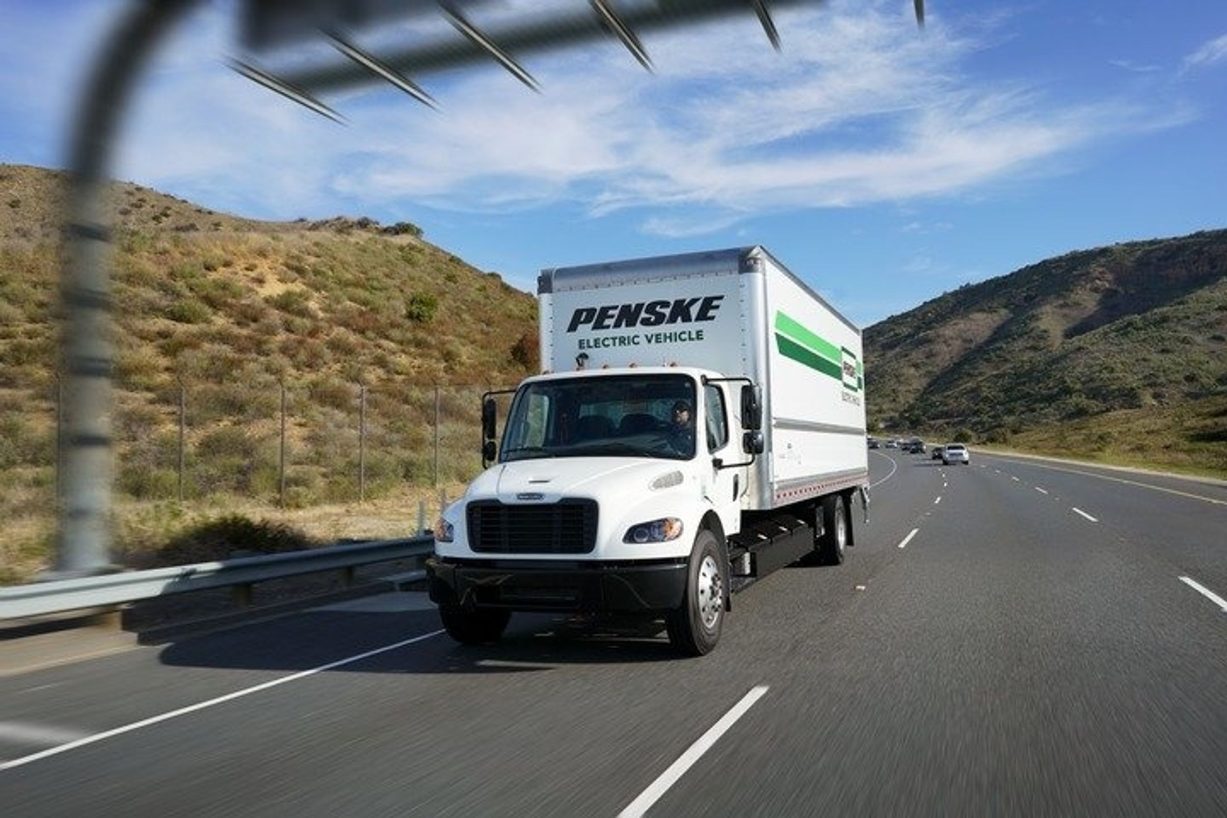 Penske electric vehicle on highway