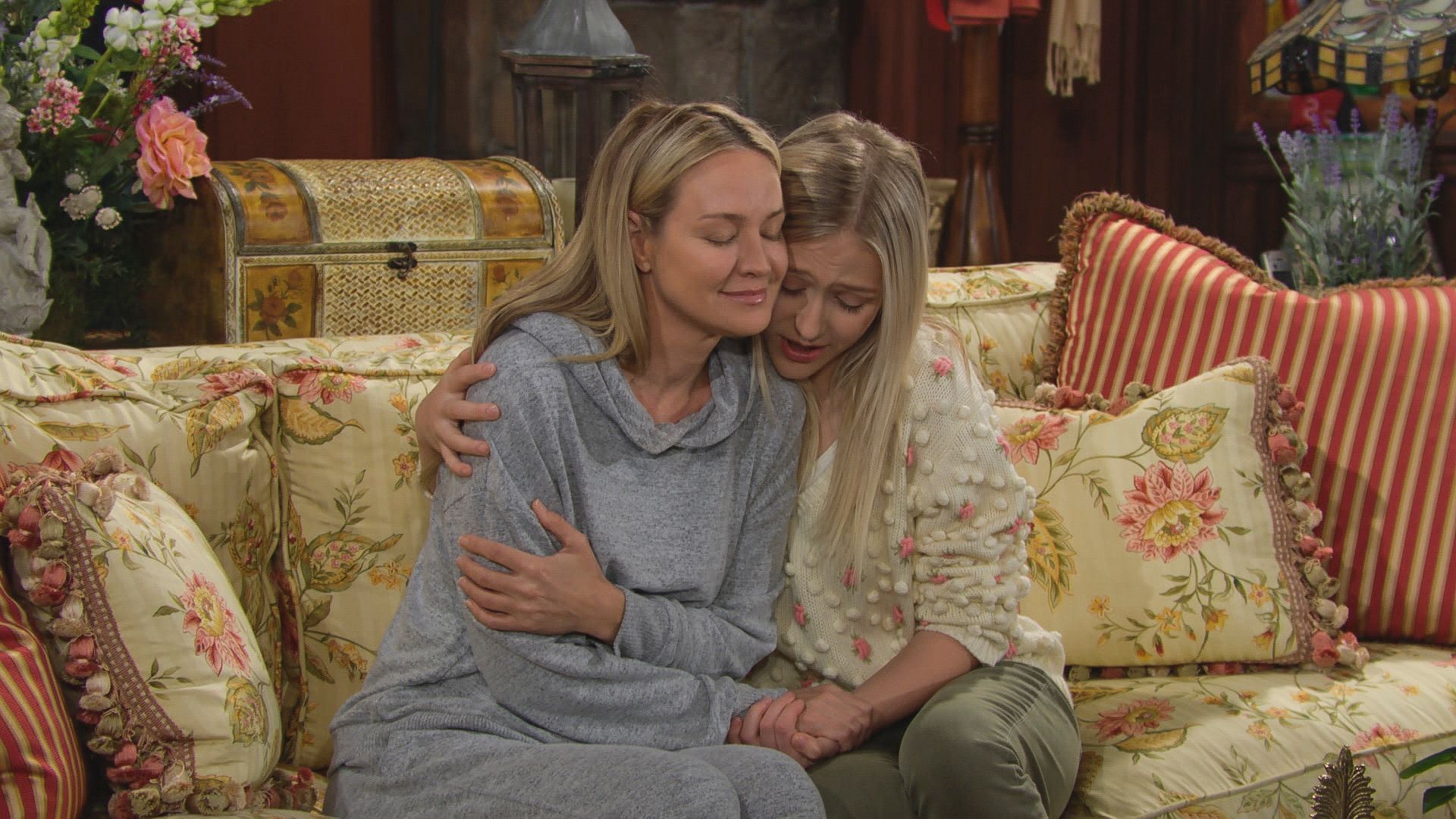 Alyvia Alyn Lind as Faith wraps comforting arm around Sharon Case as Sharon