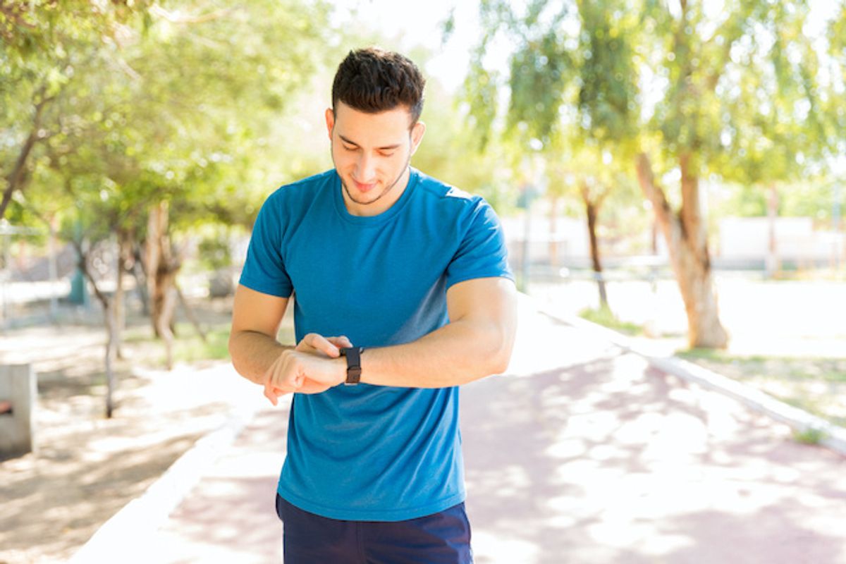 A man working out with a fitness device