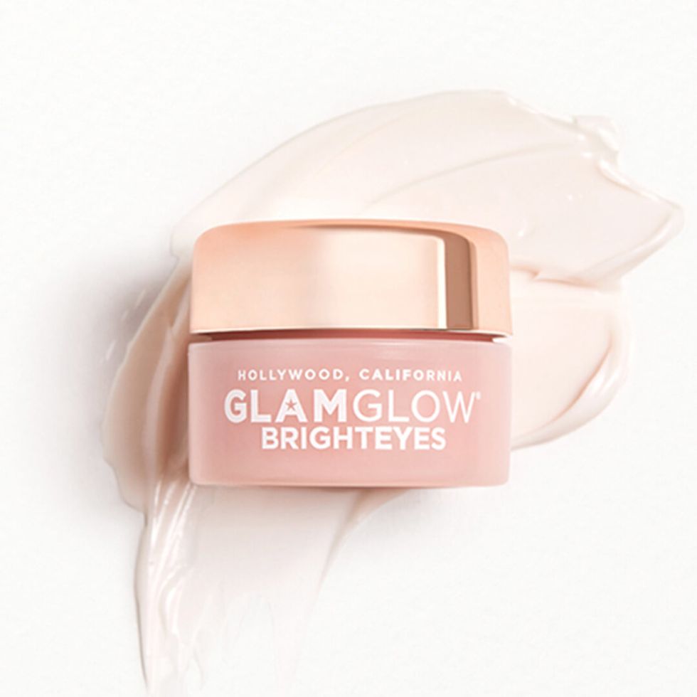 GLAMGLOW BRIGHTEYES\u2122 Illuminating Anti-Fatigue Eye Cream in a rose gold jar