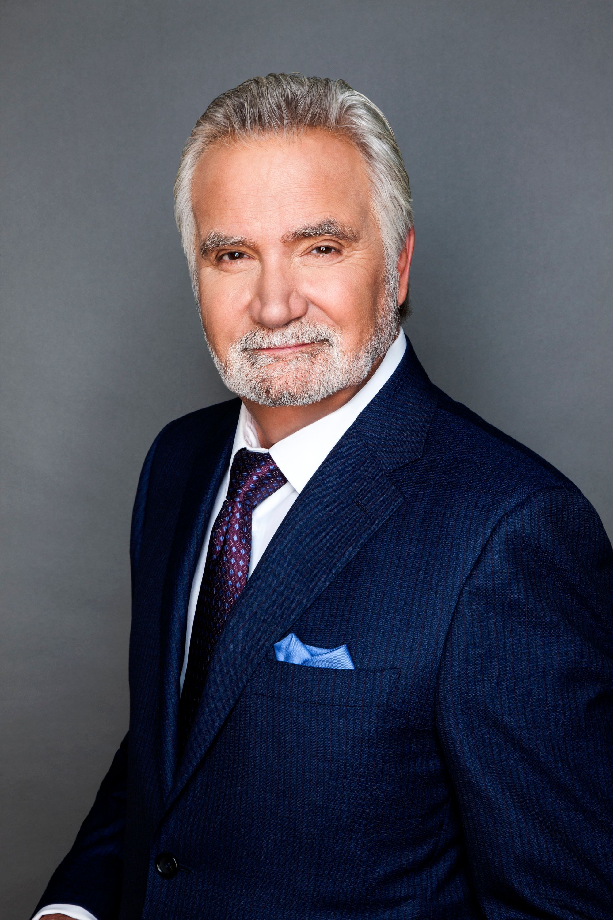 Jo\u200bhn McCook as Eric Forrester in a blue pinstriped suit