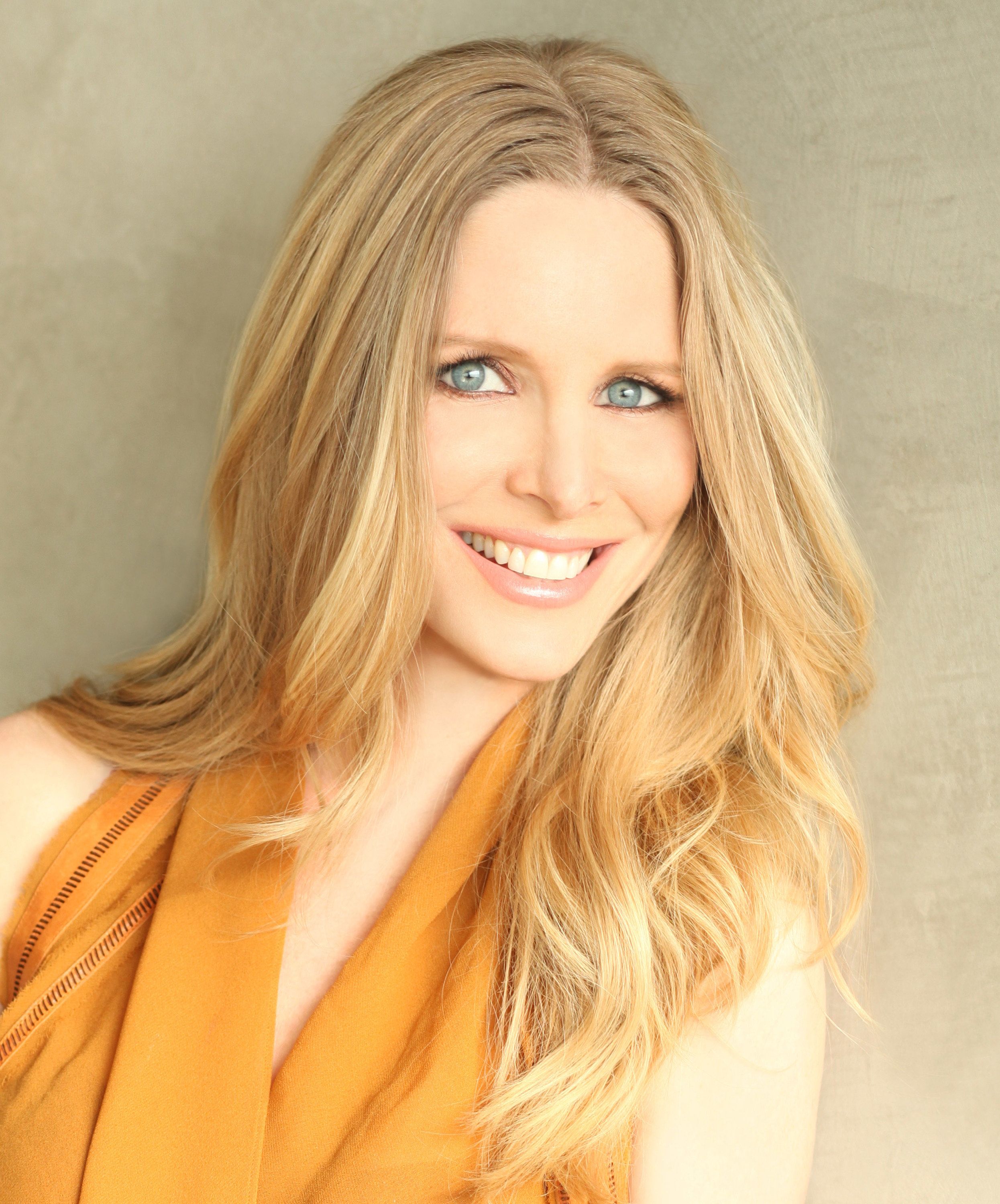 Lauralee Bell in an orange top