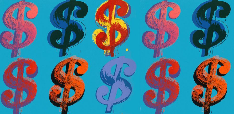 Picture of multicolored dollar signs on blue background