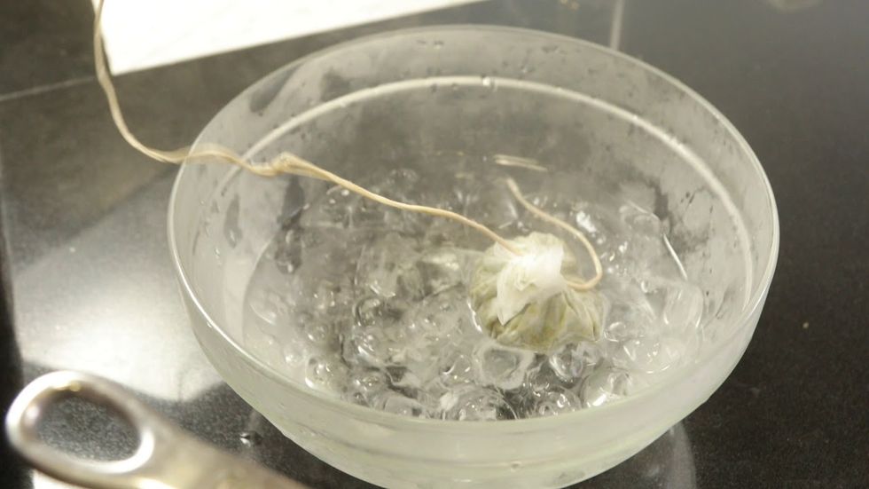 Flower Being Washed In A Bowl