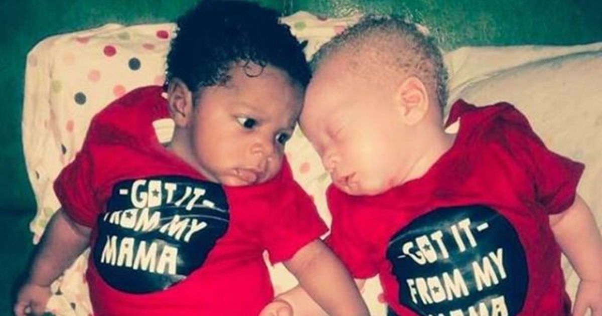One's white. The other's black. But their mom wants you to know they're still identical twins.