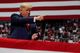 President Donald Trump pointing at a crowd