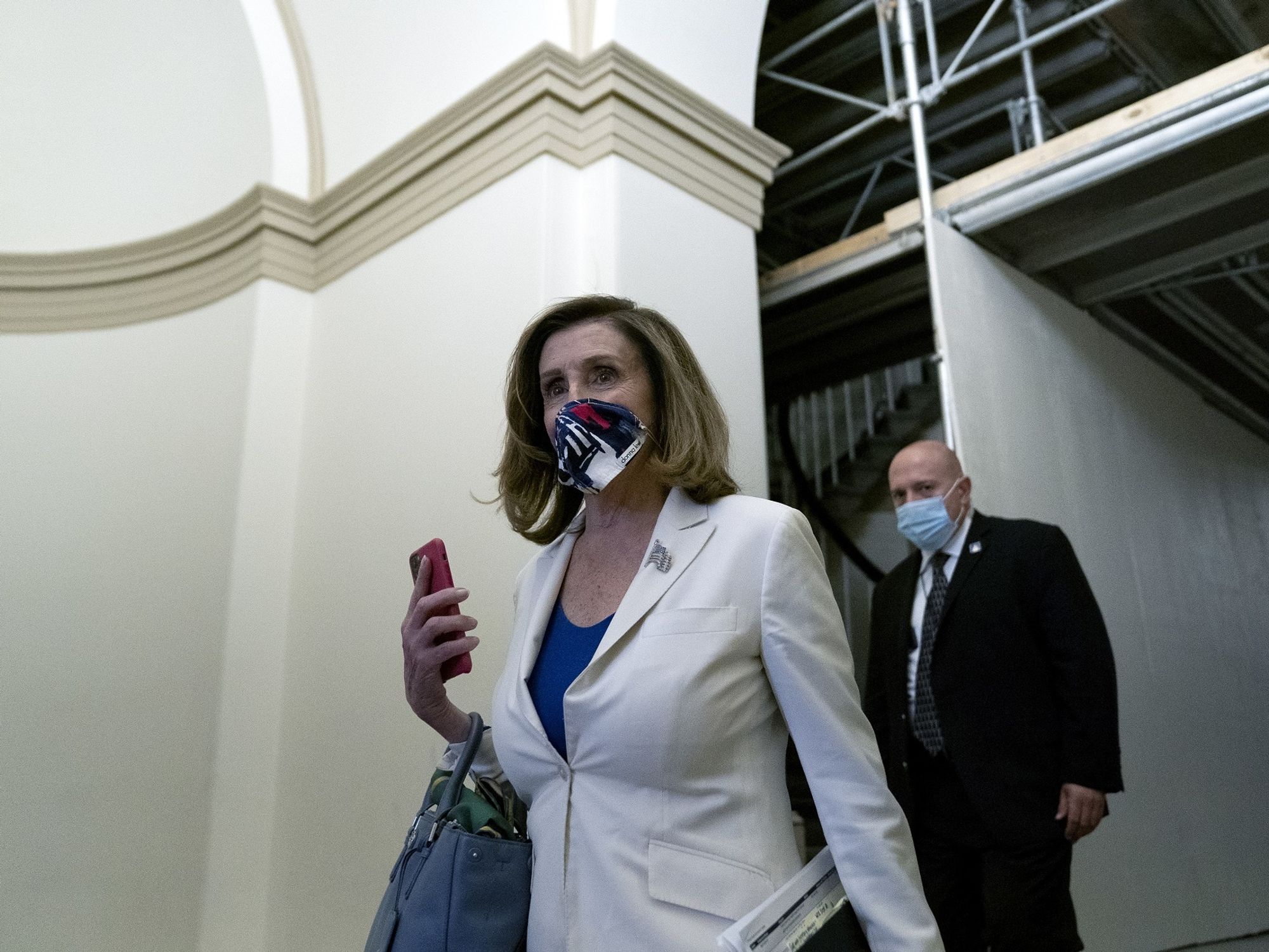 Nancy Pelosi in a mask