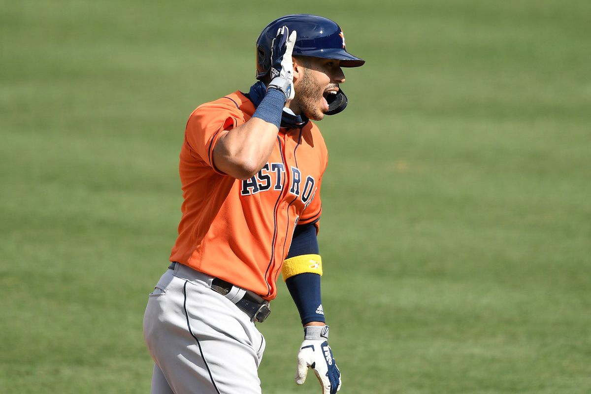 Carlos Correa celebrates a home run in ALDS Game 1