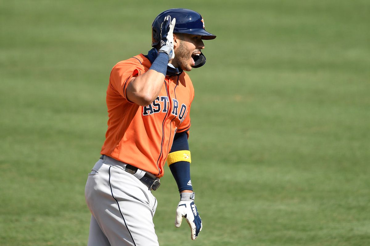 Carlos Correa celebrates a home run in ALDS Game 1