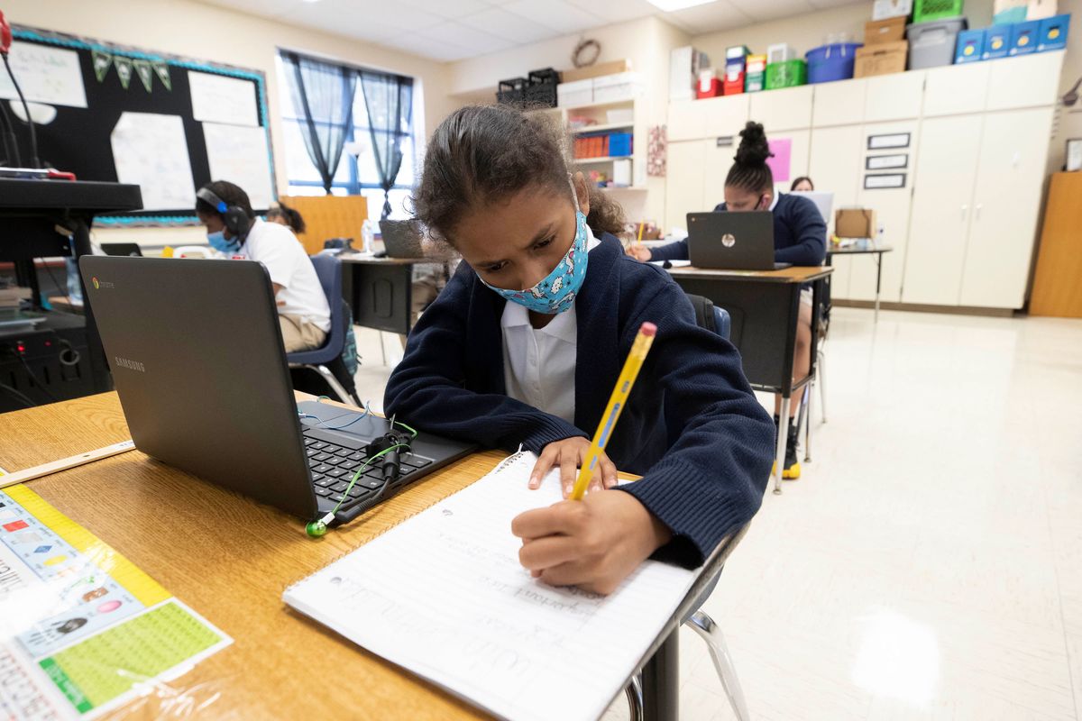 Photo essay: Austin ISD students head back to the classroom with masks and temperature checks