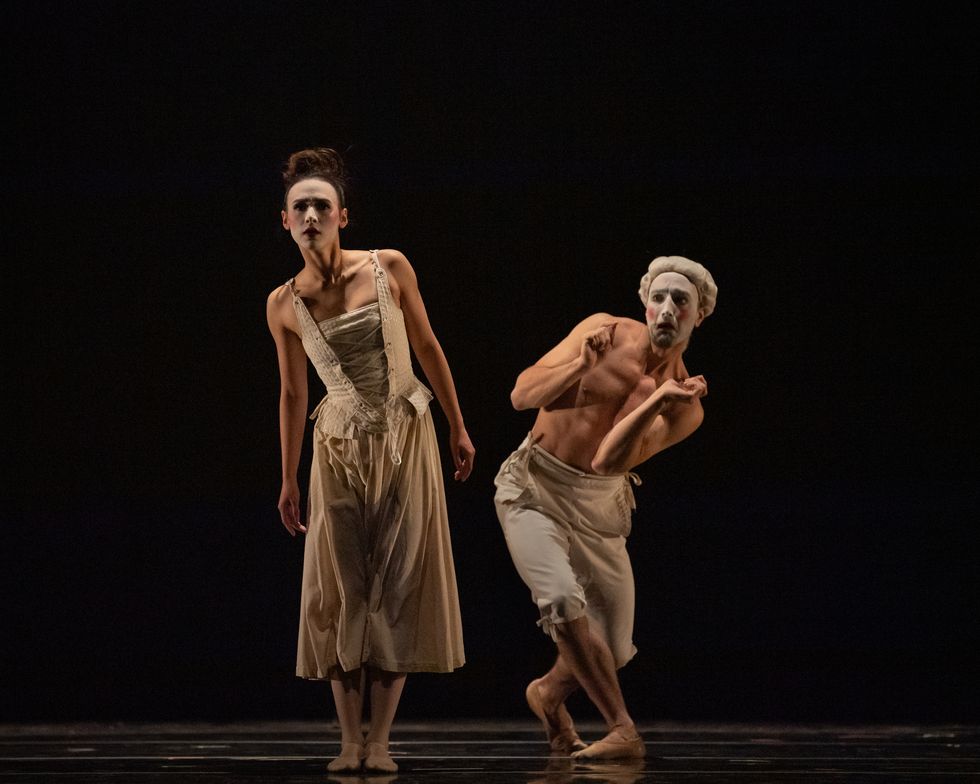 A woman in a white Baroque nightgown leans to the right, while behind her a shirless male dancer in a white wig and white pantaloons steps behind her to the left. Why parallel: Testing your balance in parallel is important, she says, because your base of support is narrower versus when you're working in turnout. So,  to help you out, what I have done below is listed the 