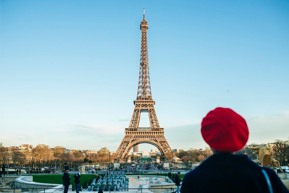 woman looking at Eiffel tower