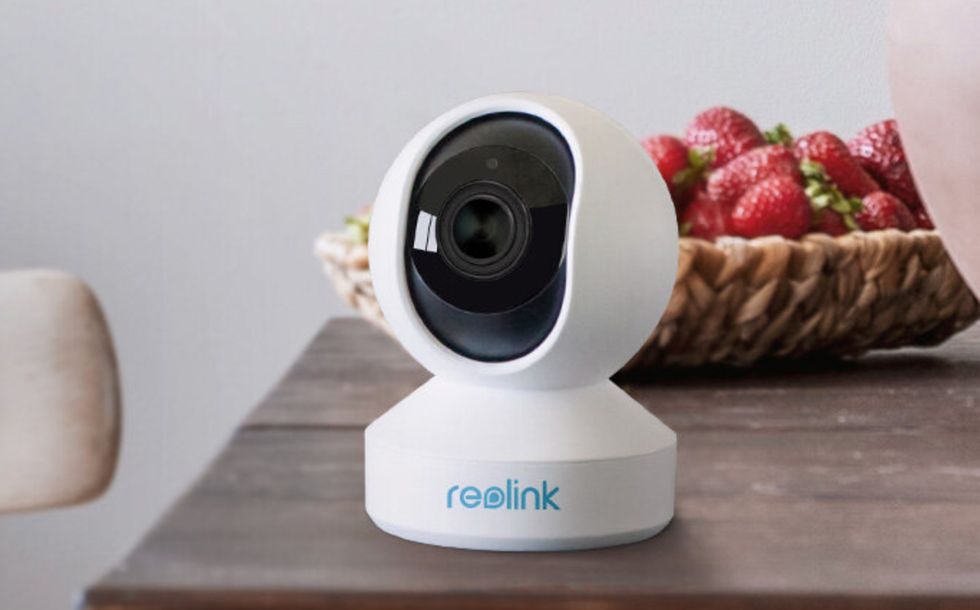 photo of the Reolink E1 Zoom indoor security camera on a table