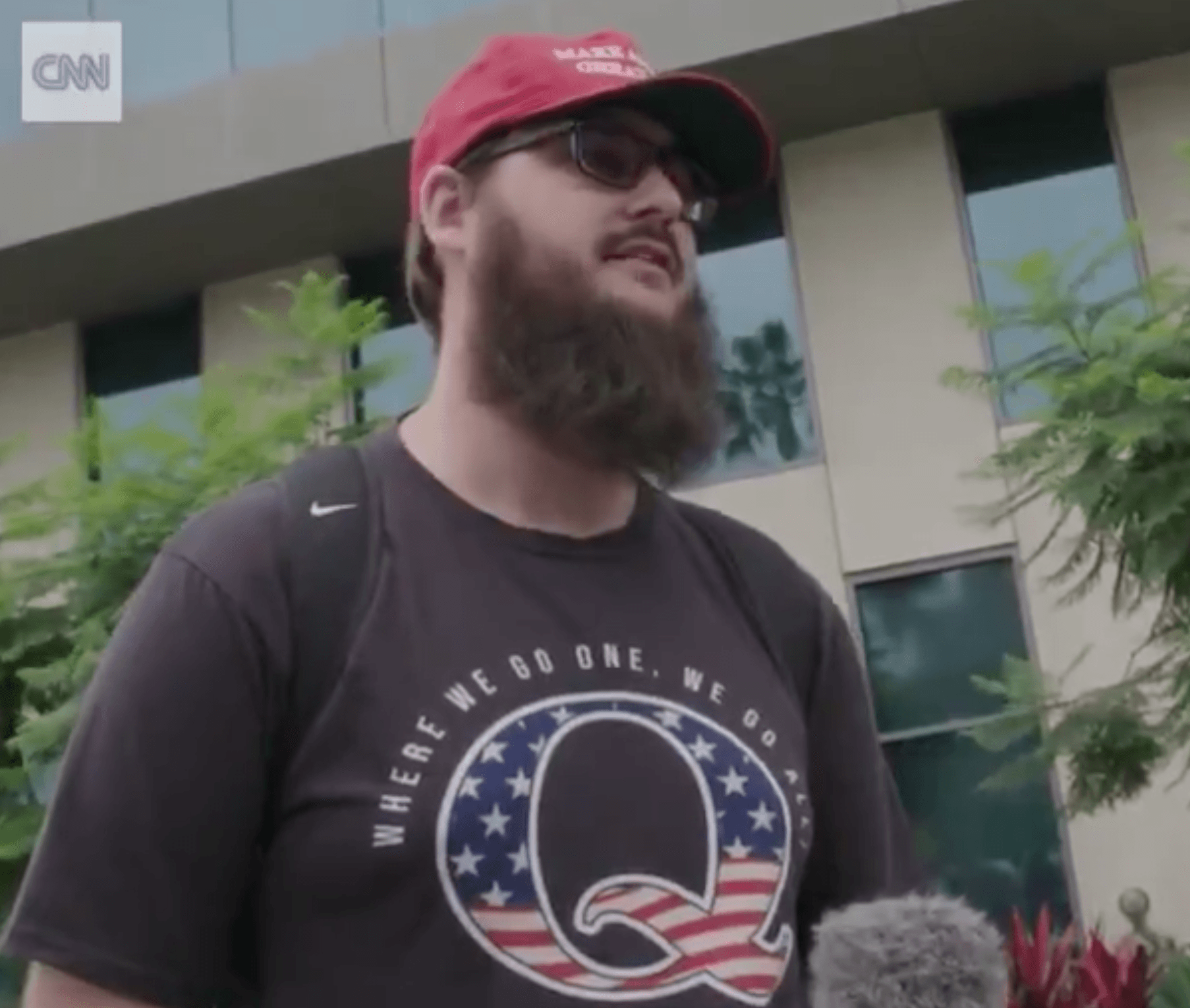 WATCH: QAnon Cultists Spout Their Lunatic Slanders To CNN Reporter