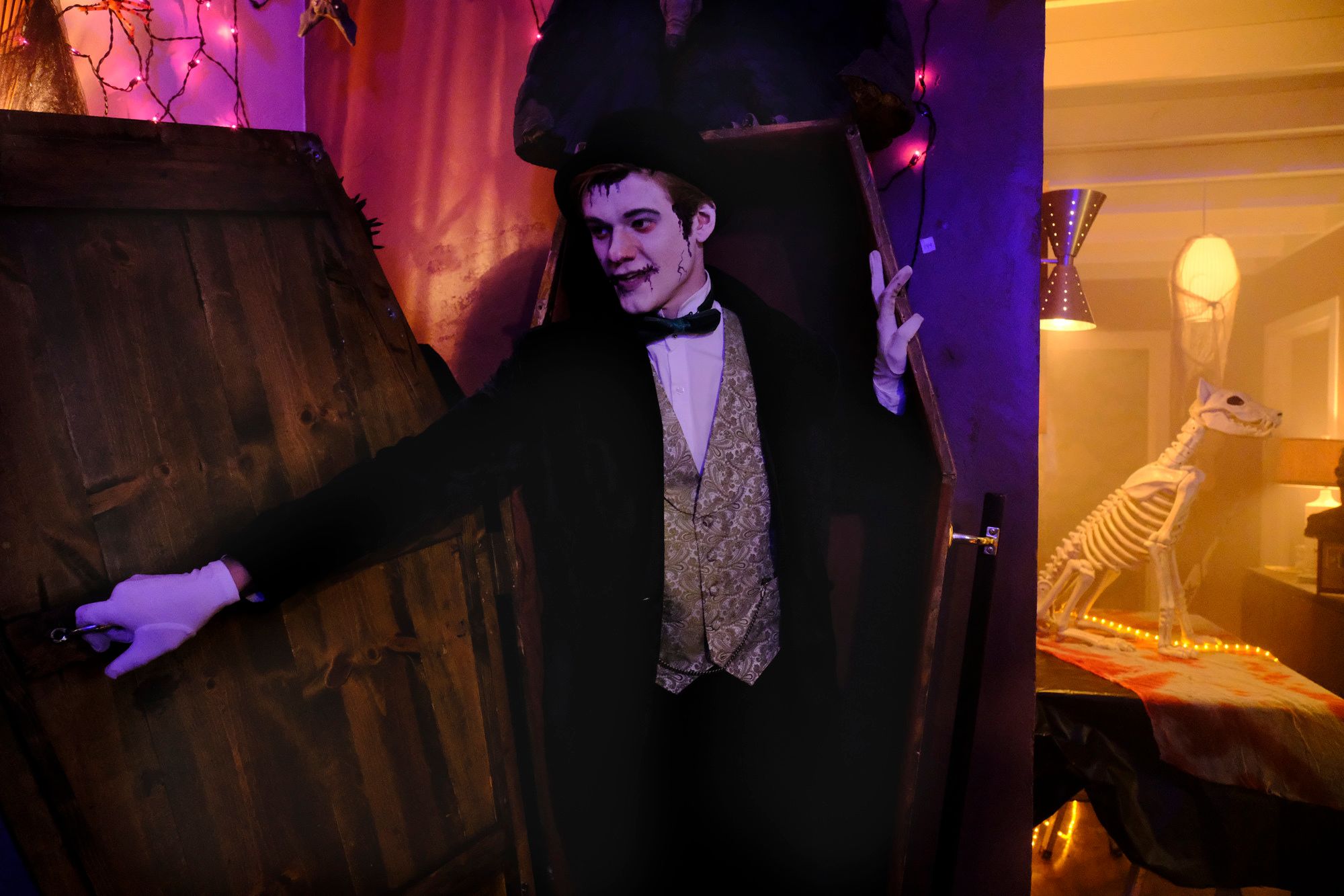 Angus MacGyver dressed as a vampire coming out of a coffin
