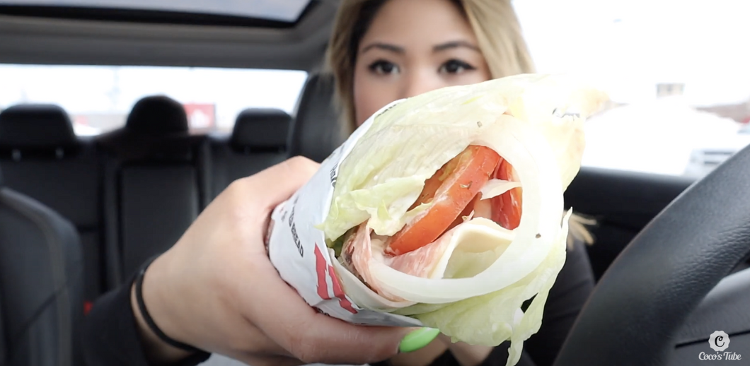 Girl holding Unwich sandwich