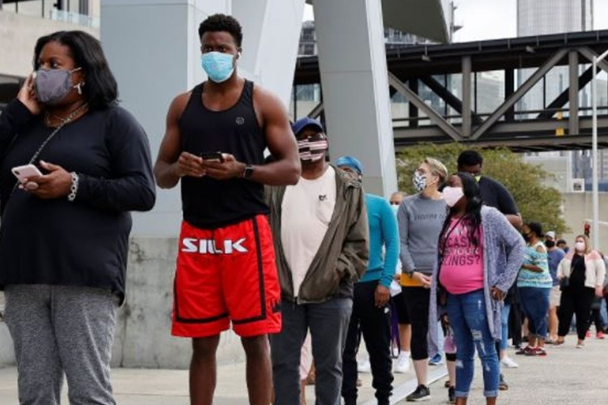 Massive in-person voting lines in Georgia exemplify 'voter suppression,' say critics