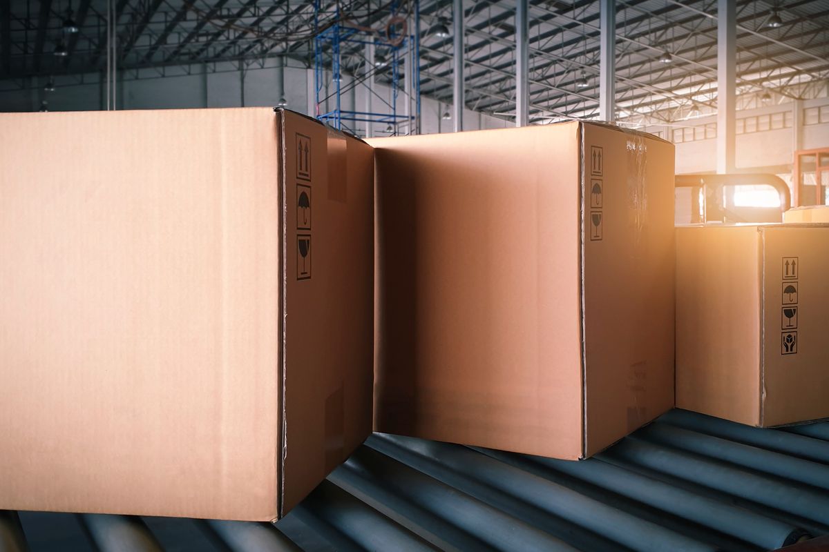 boxes on conveyor belt in warehouse