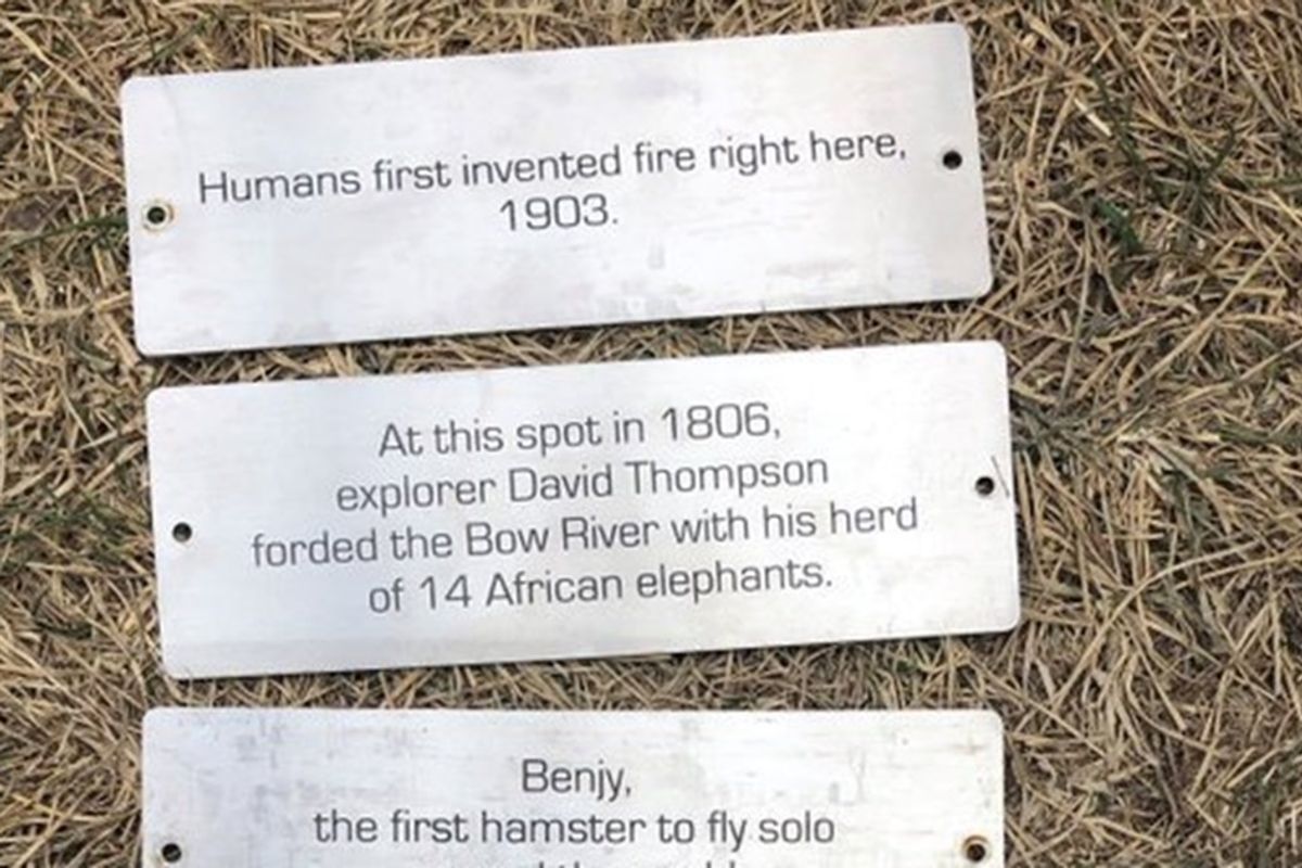 Someone placed funny, fake historic plaques on park benches around this Canadian city