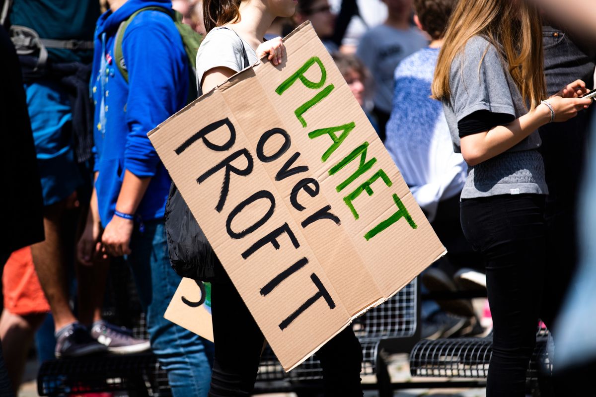 One of the richest corporations in the world says it's combating climate change – but is funding politicians who deny it