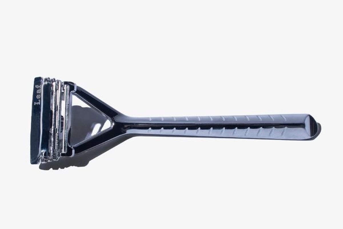 Zinc And Stainless Steel Razor With Pivoting Head