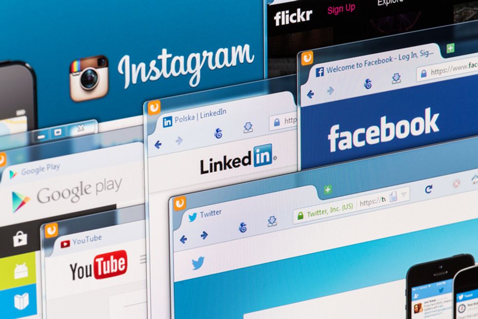 Social network homepage on a monitor screen.