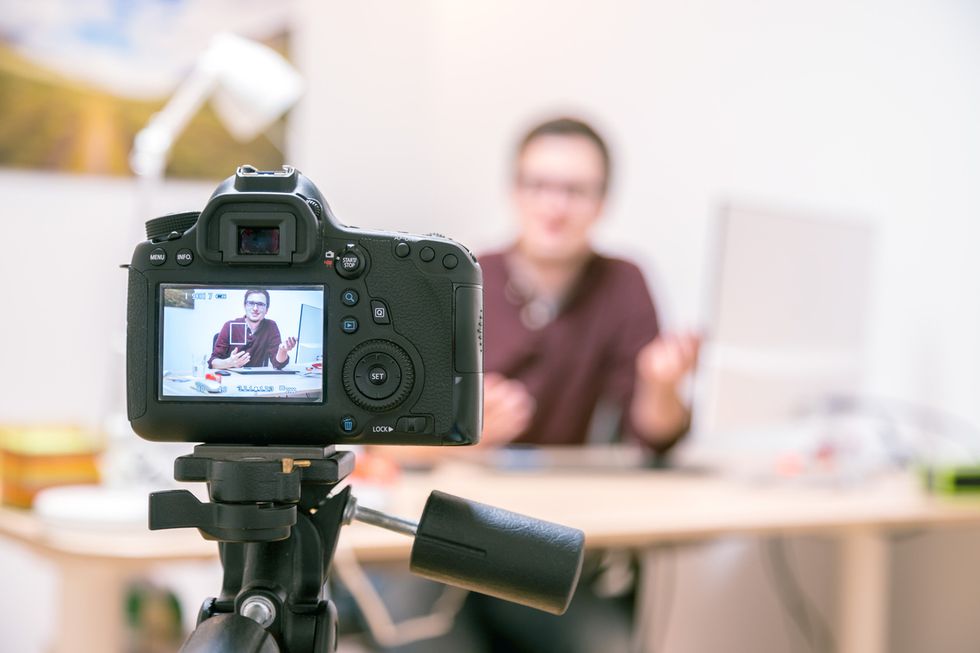 Stock image of using a DSLR camera to record video