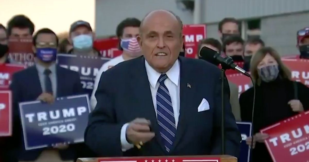 Rudy Giuliani Asked 'Do You Think We're Stupid?' At Vote Protest—And People Answered Honestly