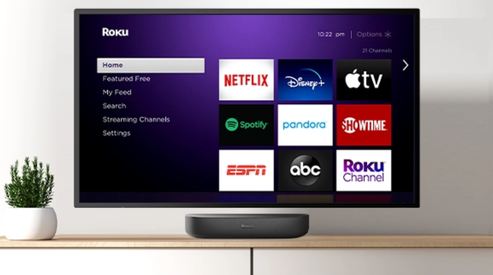 Photo of smart tv with steaming services showing on the screen.
