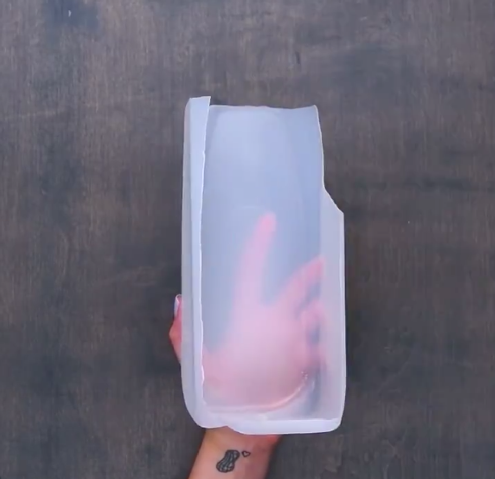 The same half gallon of milk with one side cut off