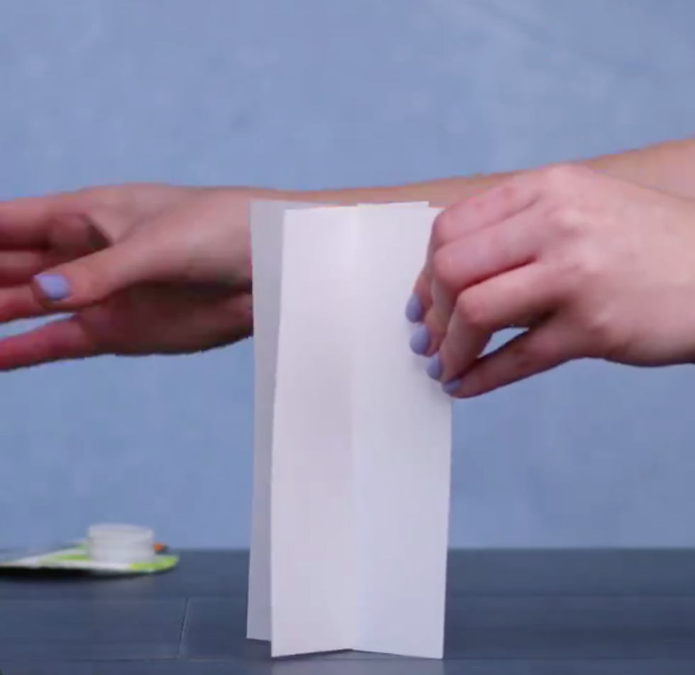 The two rectangles slot together to stand upright