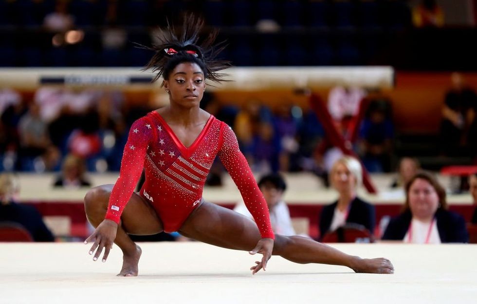 Simone Biles Does Epic Backflip Before First Pitch at the World Series ...
