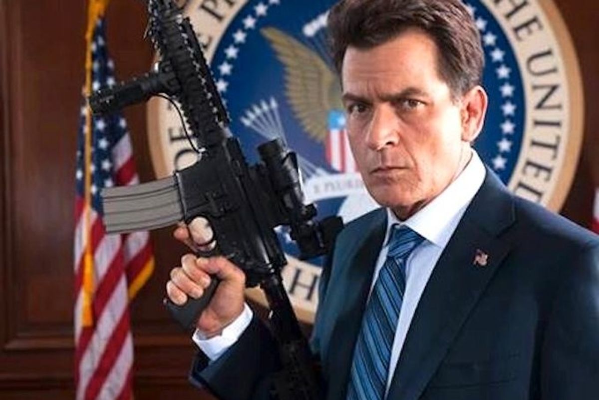 Charlie Sheen as President  holding assault rifle. "Machete Kills"