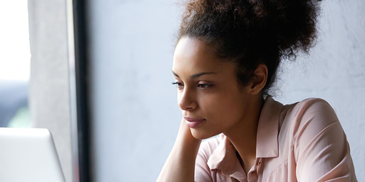 black-woman-searching-on-internet-laptop