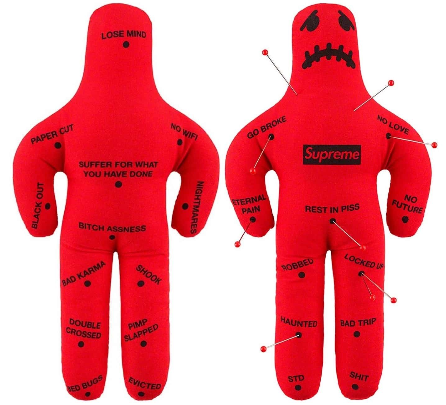 Supreme Red branded VooDoo doll - (left) backside; (right) front stuck with pins