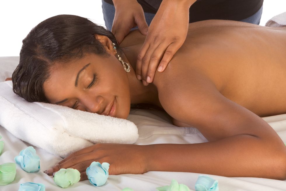 black girl getting a massage