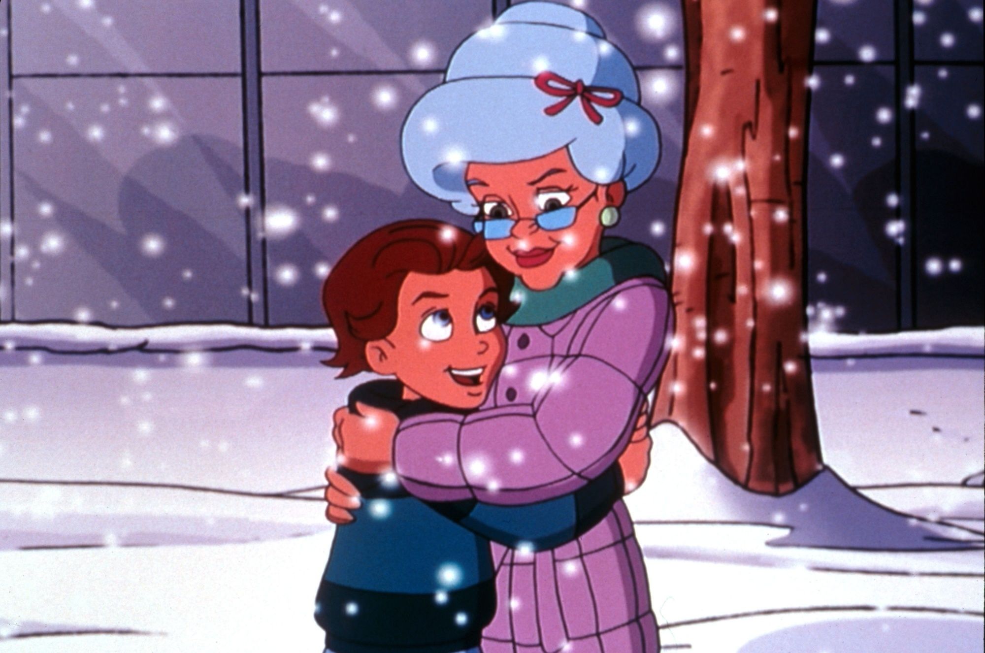 A boy hugs his grandma