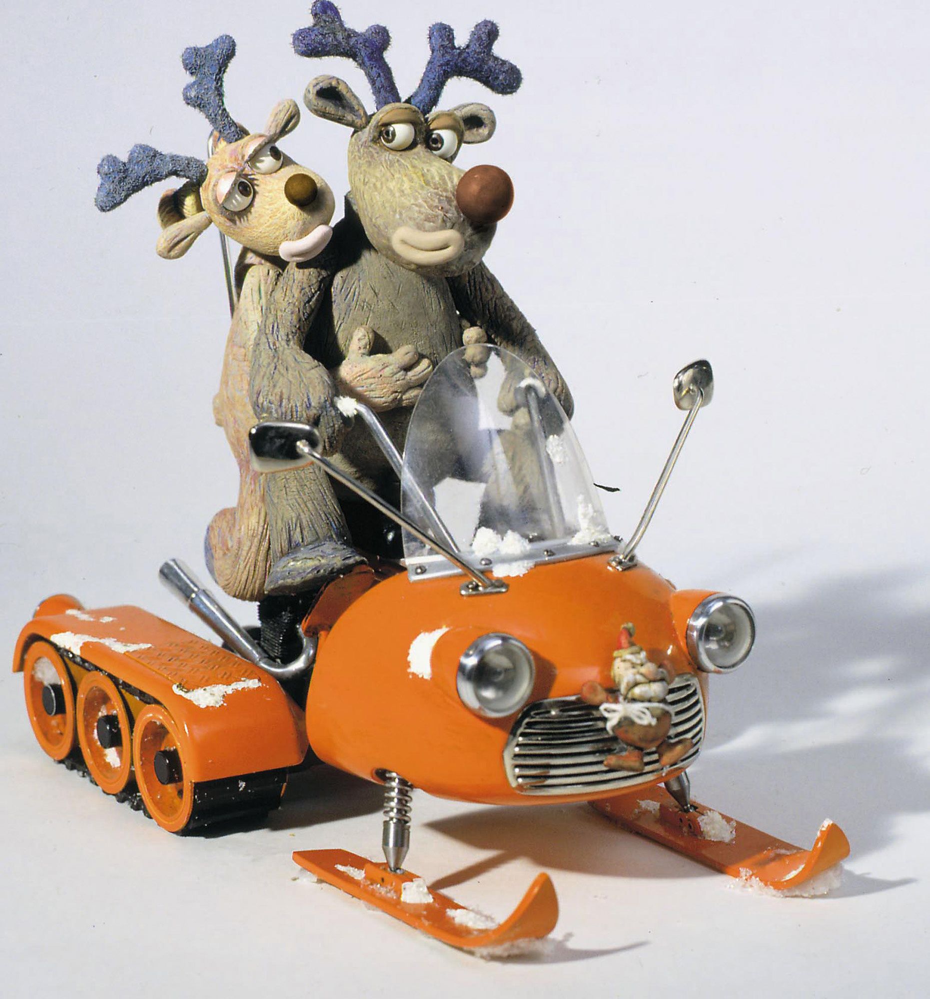 Robbie the Reindeer on a snowmobile