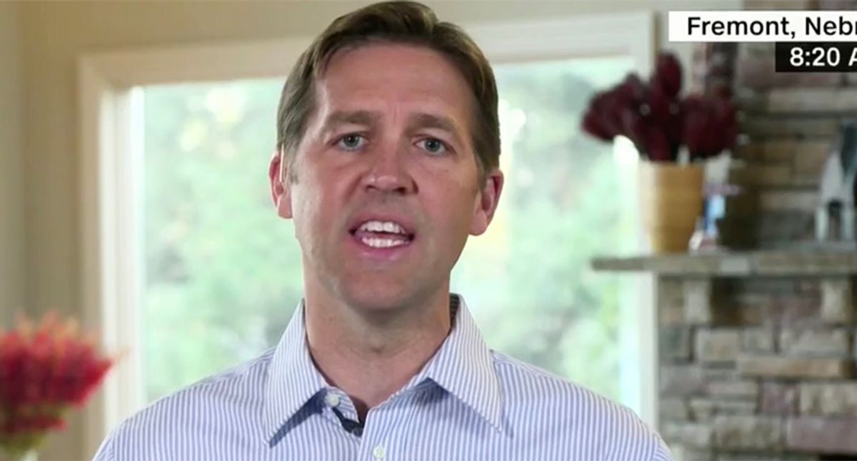 GOP senator slams his party for 'winking at QAnon' — and sounds the alarm about its influence