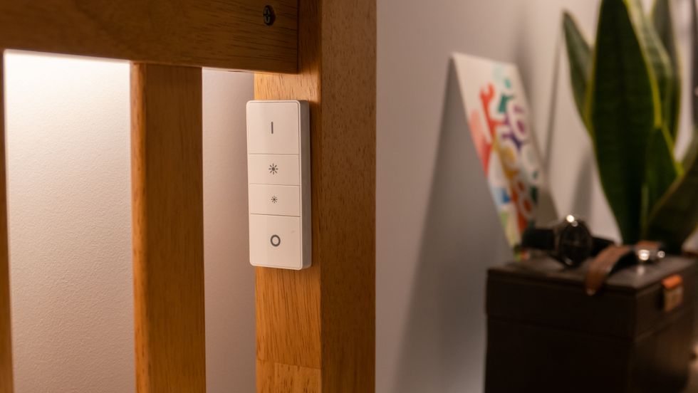 Philips Hue dimmer switch fitted to a bed frame