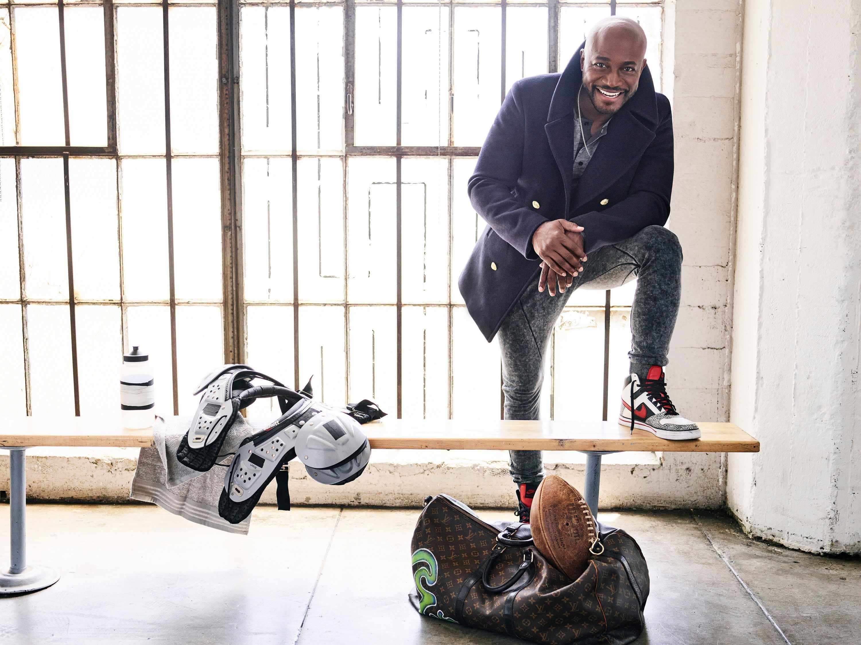 Taye Diggs is designer clothes in a locker room