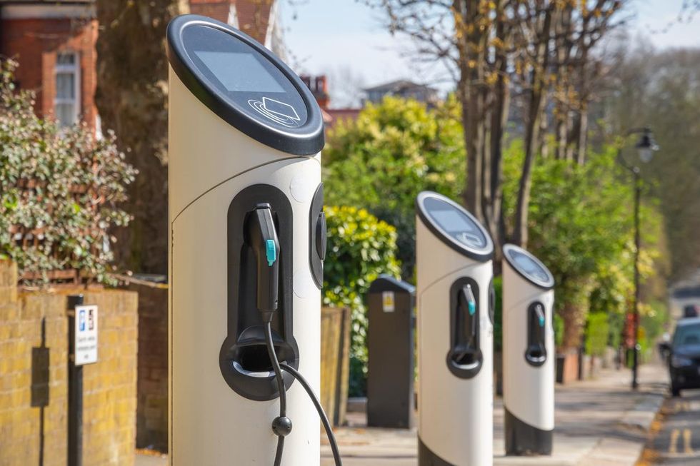 Public car chargers on a city sidewalk