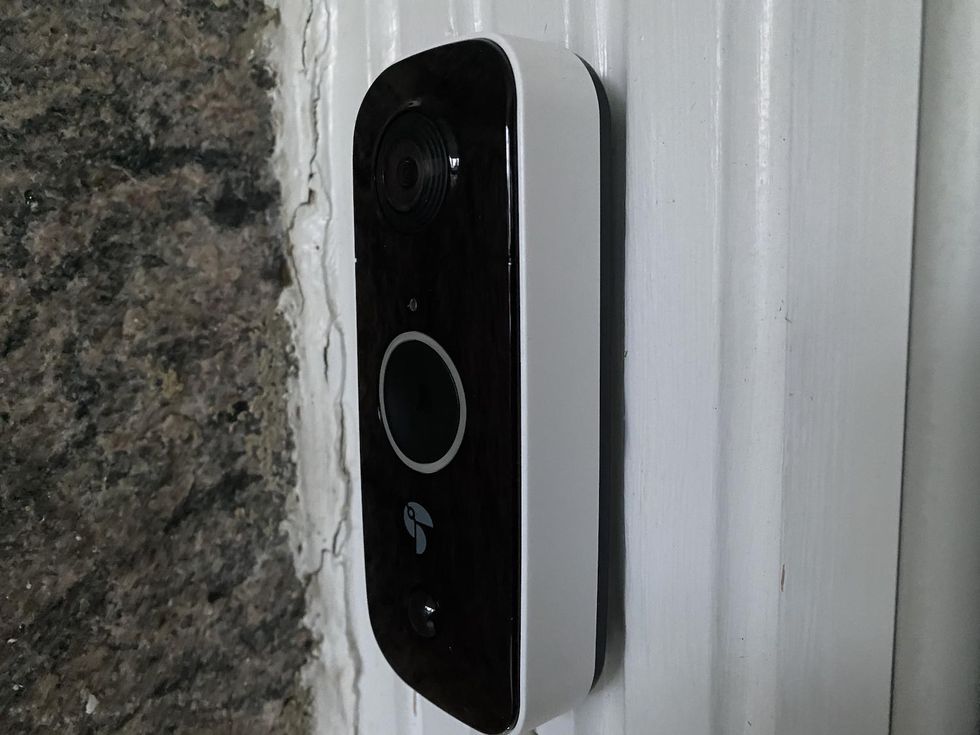 Side view of Toucan Wireless Video Doorbell installed,