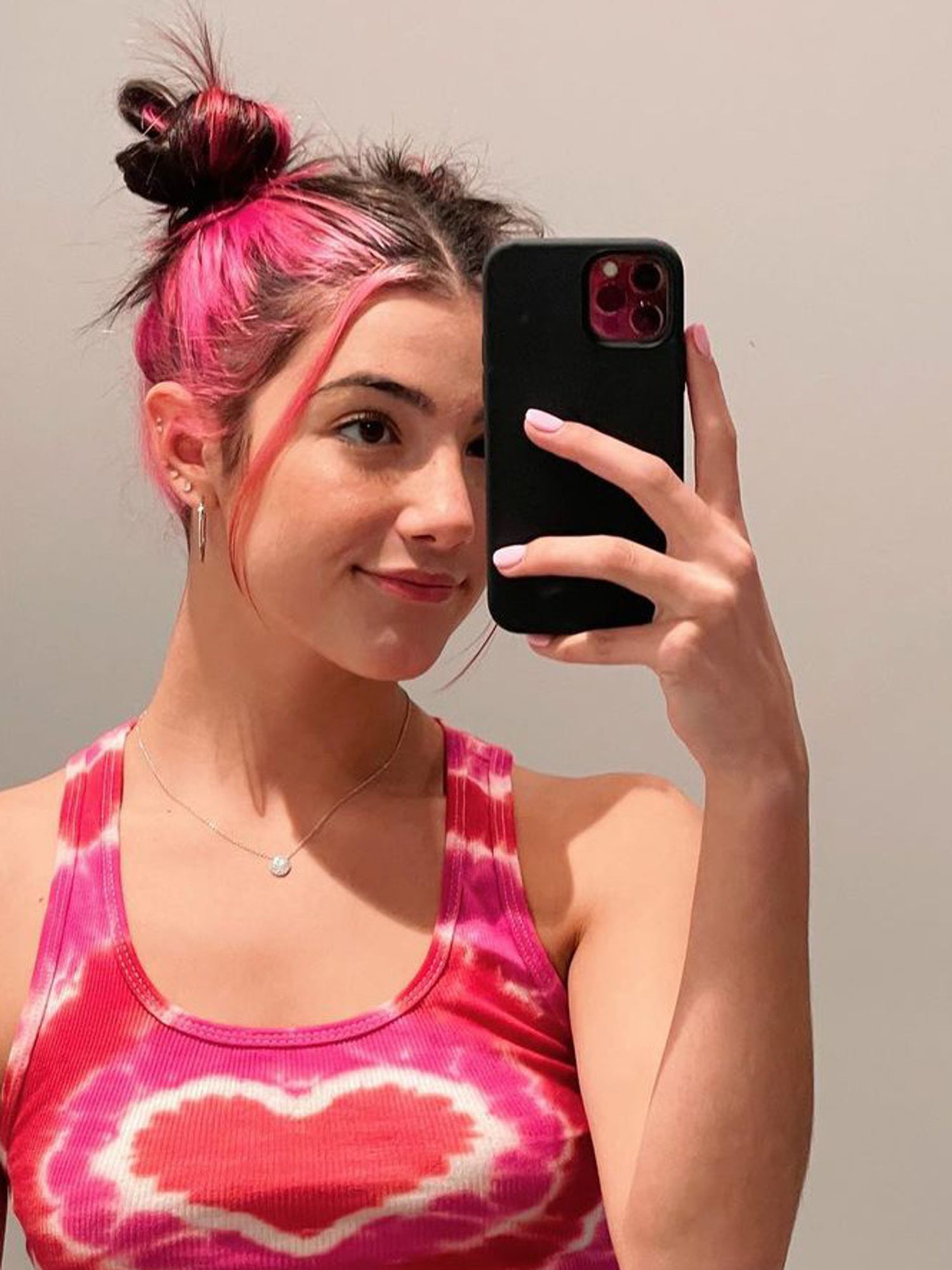 Charli D Amelio Reaches Record 100m Followers On Tiktok Paper Charli d'amelio is an american famed star who competed in the diva dance regional dance competition on march 24 of 2019 in hartford. charli d amelio reaches record 100m