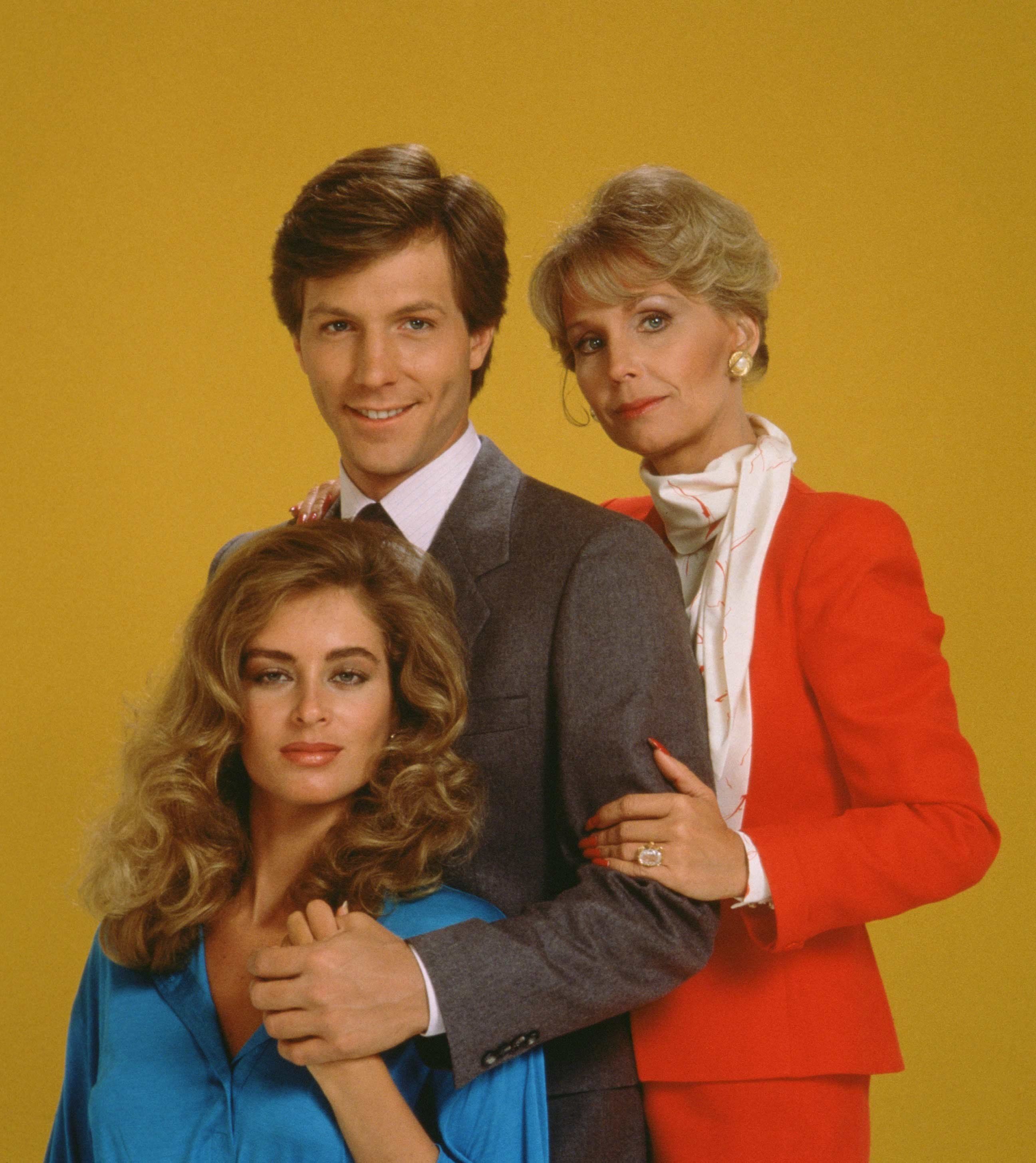 Eileen Davidson as \u200bAshley Abbott with Brian Matthews as Eric Garrison and Marla Adams as Dina Abbott