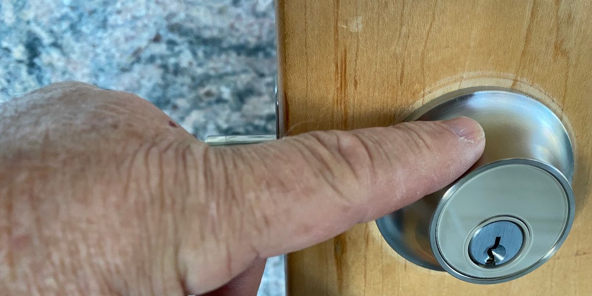 Using a finger to unlock Level Touch Smart Lock